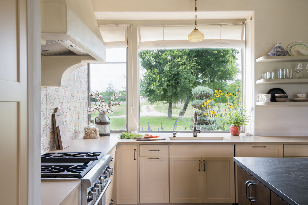 Example of a mountain style kitchen design in Austin