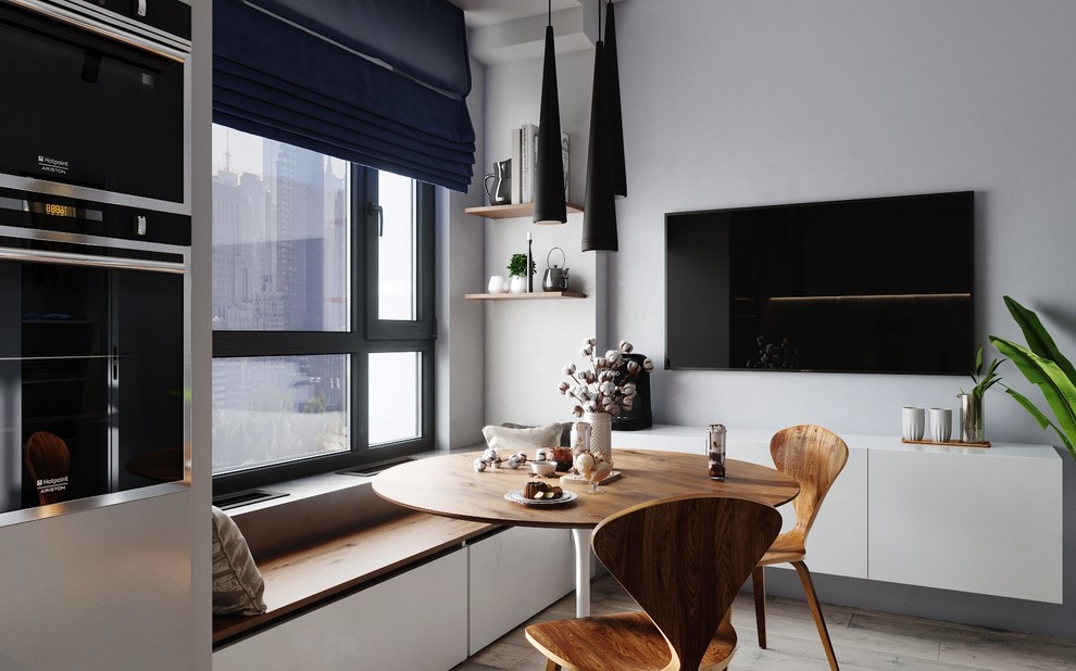 Уютная зона для сидения под подоконником.