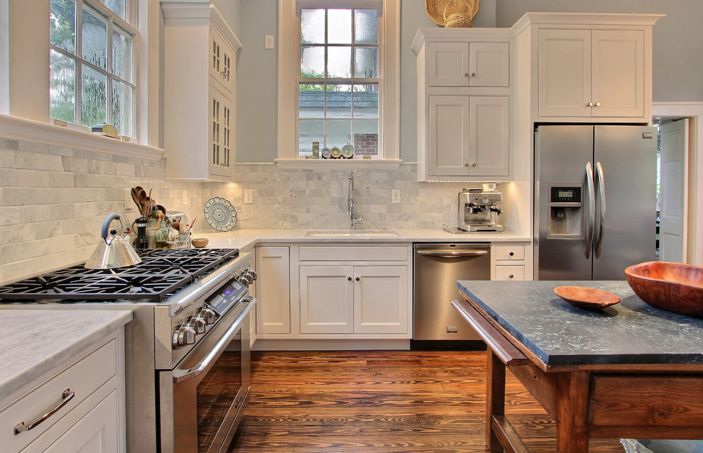 Transitional kitchen photo in Los Angeles with gray backsplash and stone tile backsplash