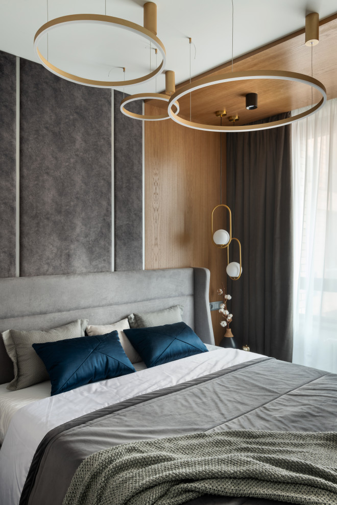Inspiration for a contemporary master bedroom in Moscow with grey walls.