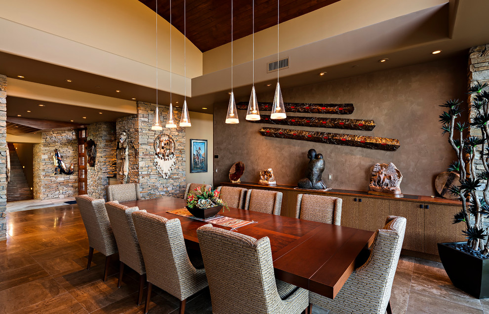 Inspiration for a large dining room in Phoenix with beige walls and no fireplace.