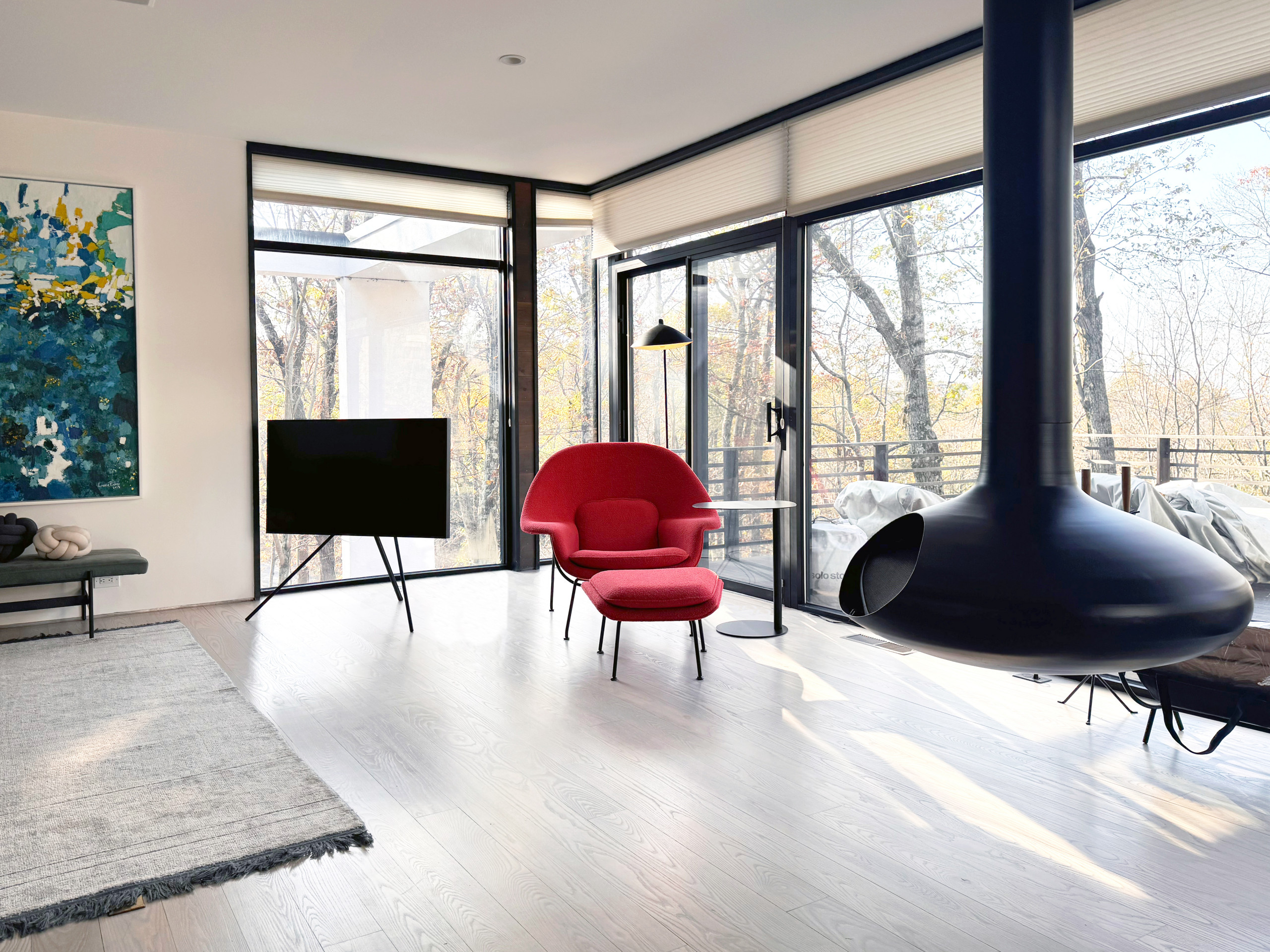 Curated furniture, a refreshed wood floor color, and thoughtful layout updates blending modern elegance with cozy charm.