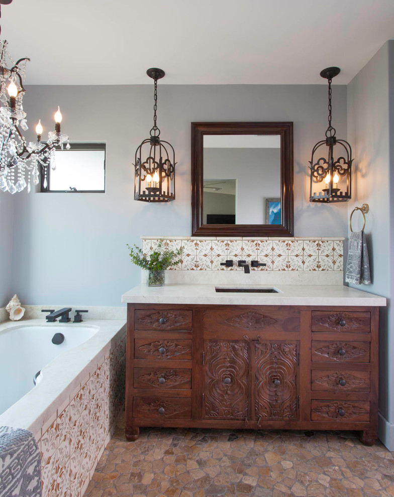 Example of a mid-sized tuscan bathroom design in San Diego