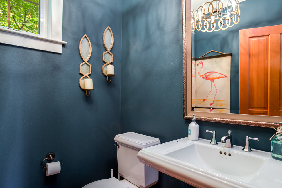 This is an example of a transitional powder room in Seattle.