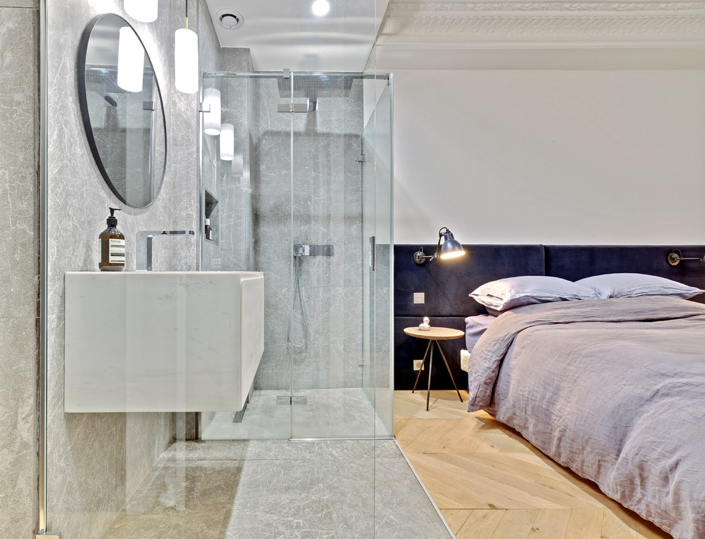 This is an example of a small contemporary 3/4 bathroom in Paris with a curbless shower, gray tile, marble, white walls, marble floors, a console sink, marble benchtops, grey floor, a hinged shower door and white benchtops.
