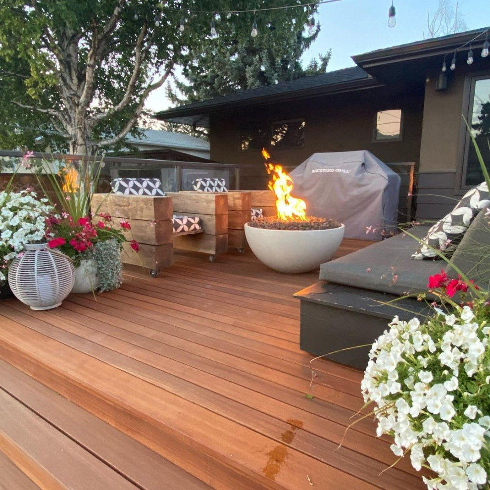Inspiration for a contemporary patio remodel in Vancouver with a fire pit