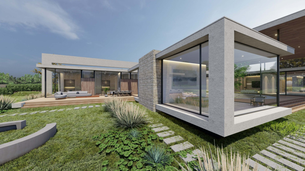 На фото: огромный частный загородный дом в современном стиле с облицовкой из бетона и плоской крышей