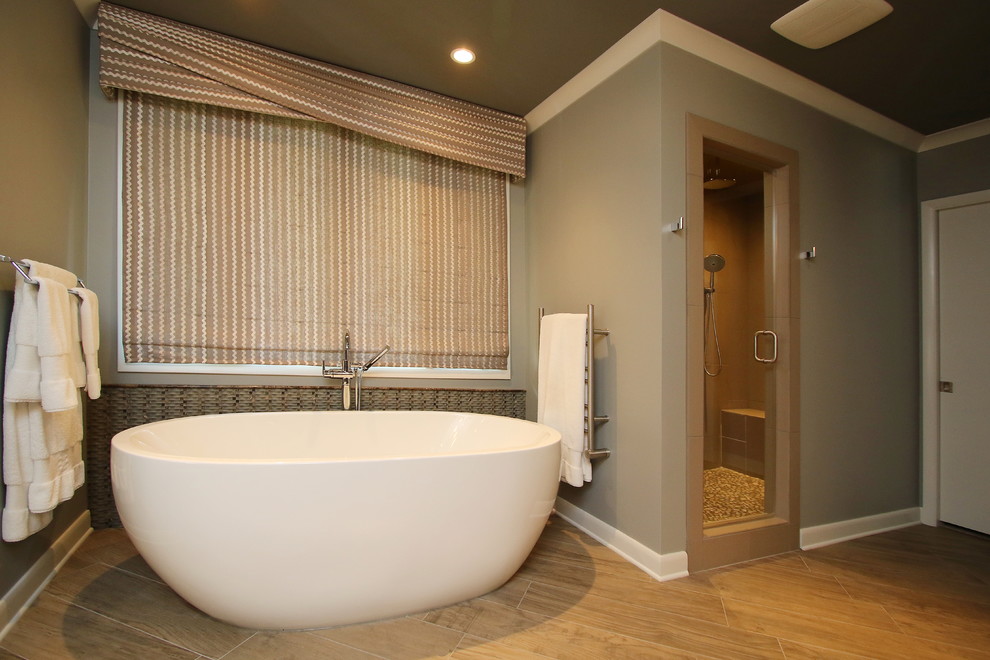 Freestanding bathtub - large transitional porcelain tile porcelain tile freestanding bathtub idea with gray walls