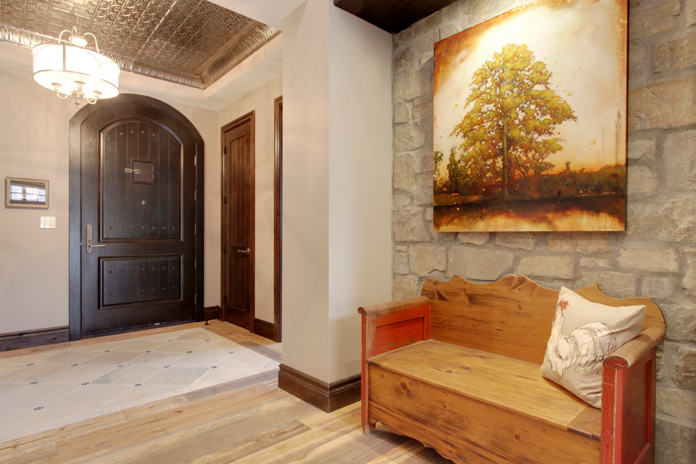 Mountain style entryway photo in Calgary
