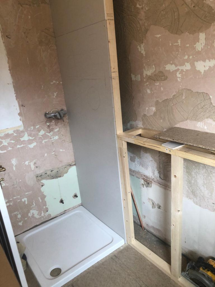 Creating a stud wall to gain additional length for bath & shower