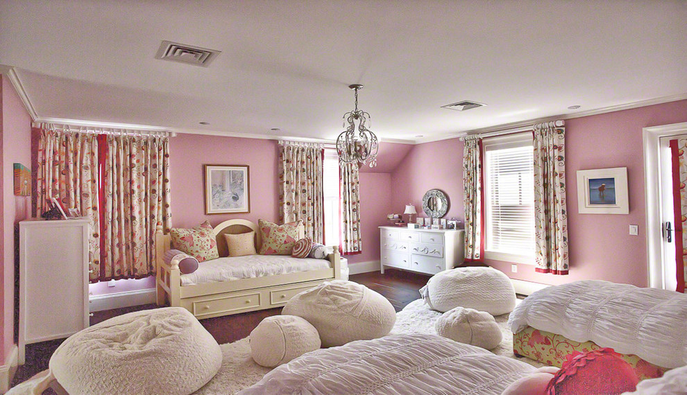 Traditional kids' room in Boston with pink walls.