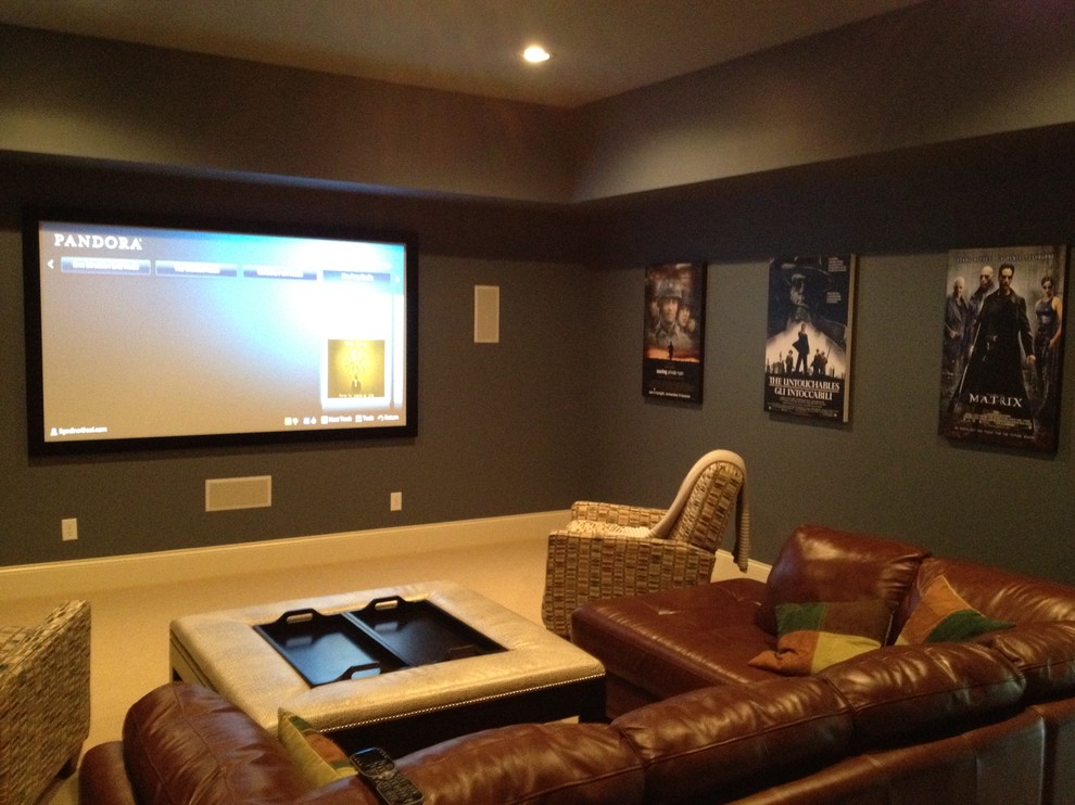 This is an example of a traditional home theatre in Charlotte.