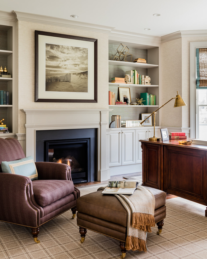 Design ideas for a transitional study room in Boston with beige walls, a standard fireplace and a freestanding desk.