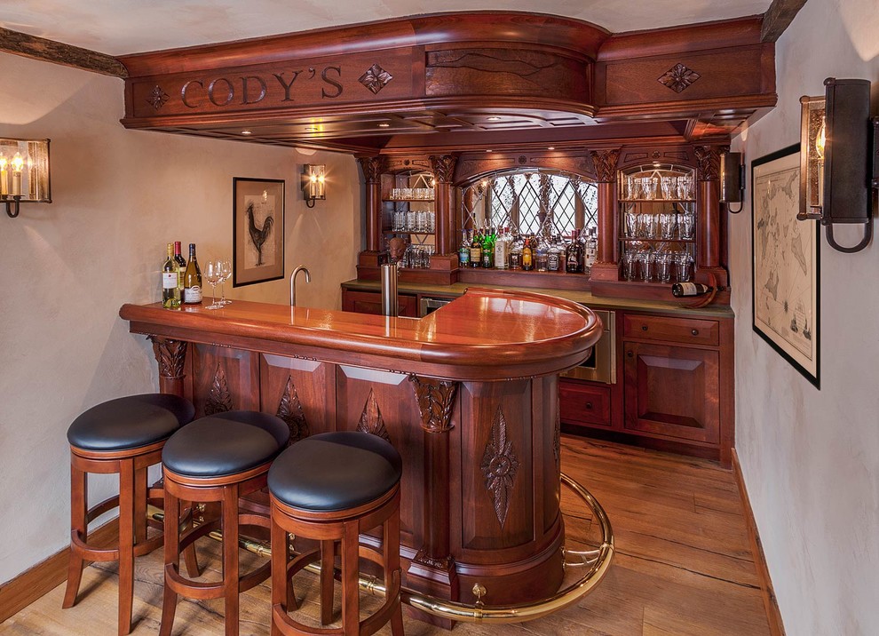 Photo of a traditional home bar in Burlington.