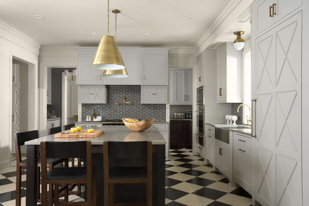 Design ideas for a transitional l-shaped separate kitchen in Minneapolis with a farmhouse sink, white cabinets, black splashback and multi-coloured floor.