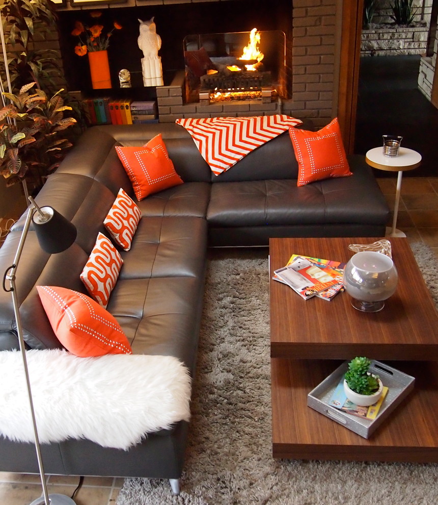 This is an example of a midcentury family room in Portland.