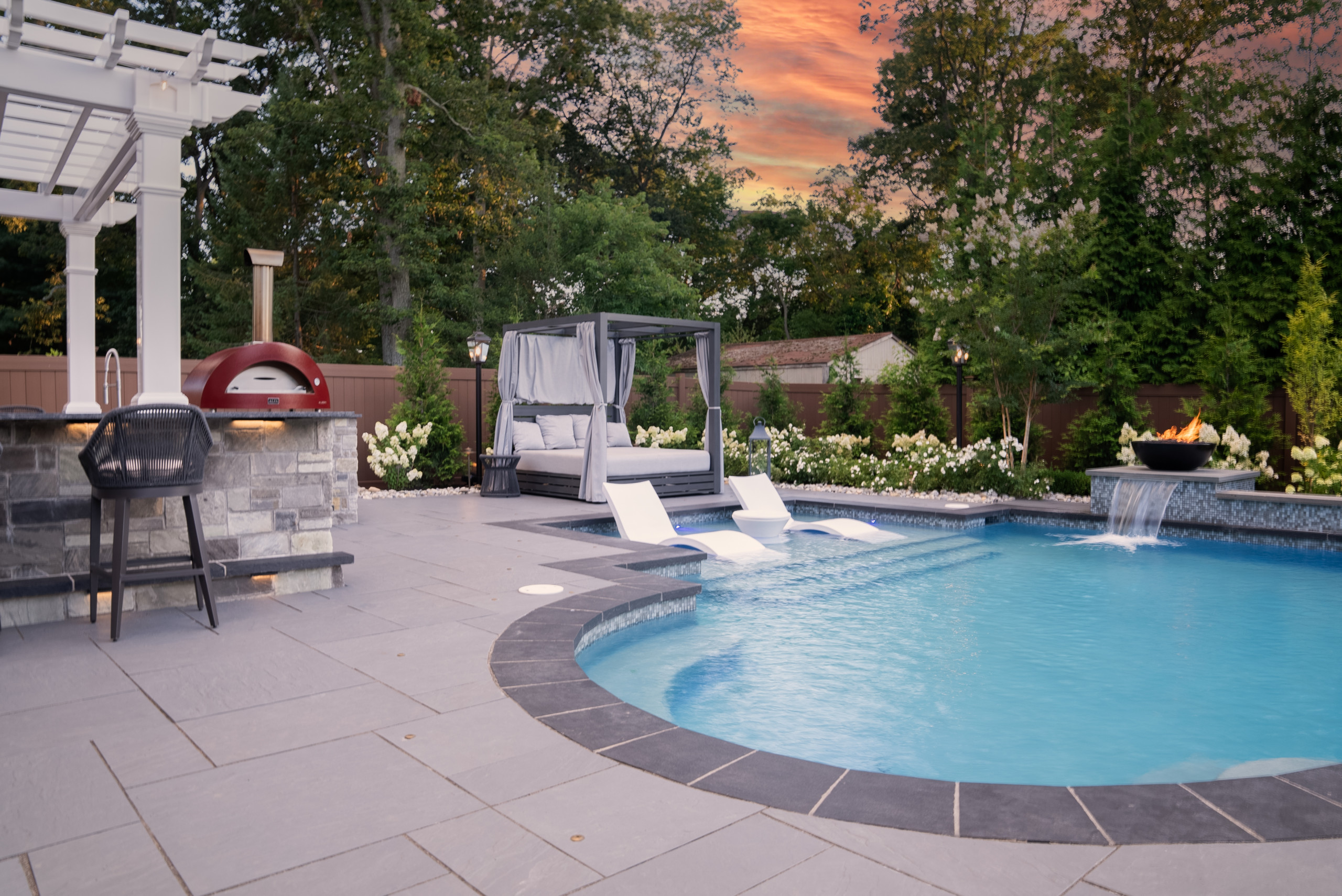 Example of a beach style pool design in New York