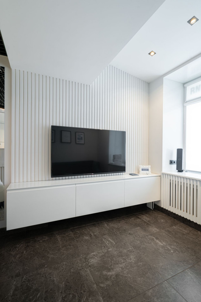 Источник вдохновения для домашнего уюта: фойе среднего размера: освещение в современном стиле с белыми стенами, полом из керамогранита и черным полом