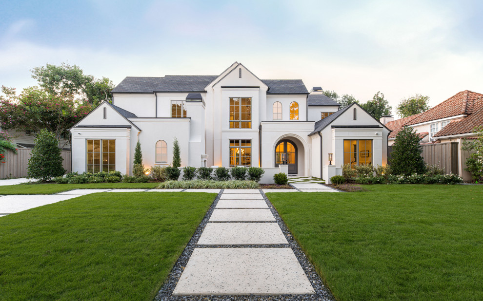 Example of a transitional exterior home design in Dallas