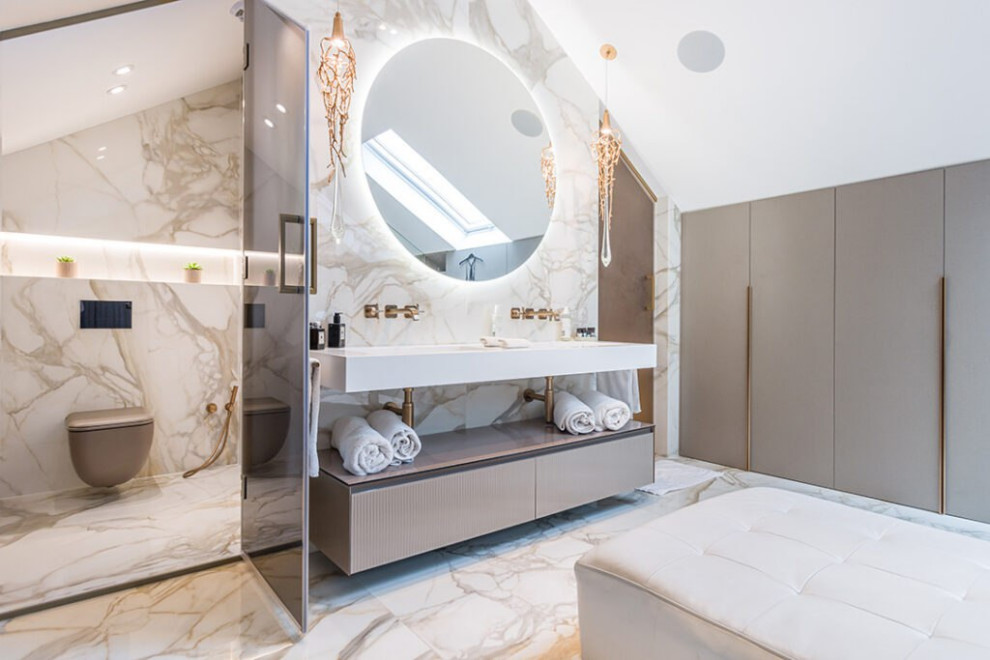 Photo of a large modern grey and white family bathroom in London with glass-front cabinets, light wood cabinets, a hot tub, a shower/bath combination, a one-piece toilet, white tiles, marble tiles, white walls, marble flooring, a built-in sink, wooden worktops, multi-coloured floors, a hinged door, white worktops, a laundry area, double sinks, a wood ceiling and panelled walls.