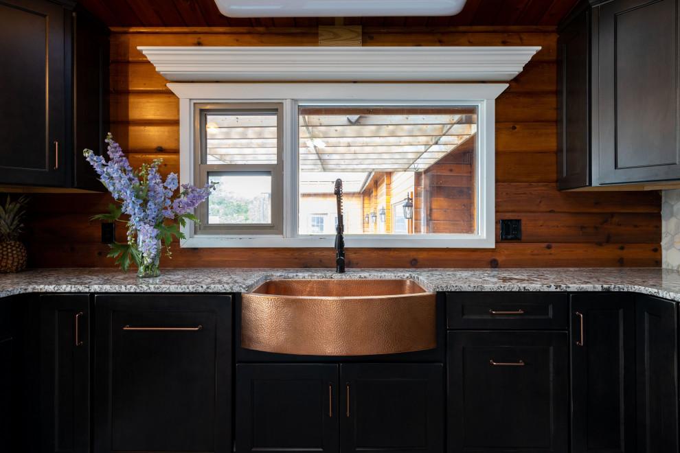 Mid-sized mountain style u-shaped ceramic tile and white floor eat-in kitchen photo with a farmhouse sink, shaker cabinets, dark wood cabinets, granite countertops, white backsplash, mosaic tile backsplash, stainless steel appliances, no island and white countertops