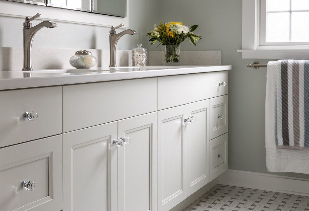 Inspiration for a mid-sized traditional master bathroom in New York with recessed-panel cabinets, white cabinets, a bidet, white tile, subway tile, green walls, porcelain floors, an undermount sink, engineered quartz benchtops, white floor, white benchtops, a niche, a double vanity and a built-in vanity.