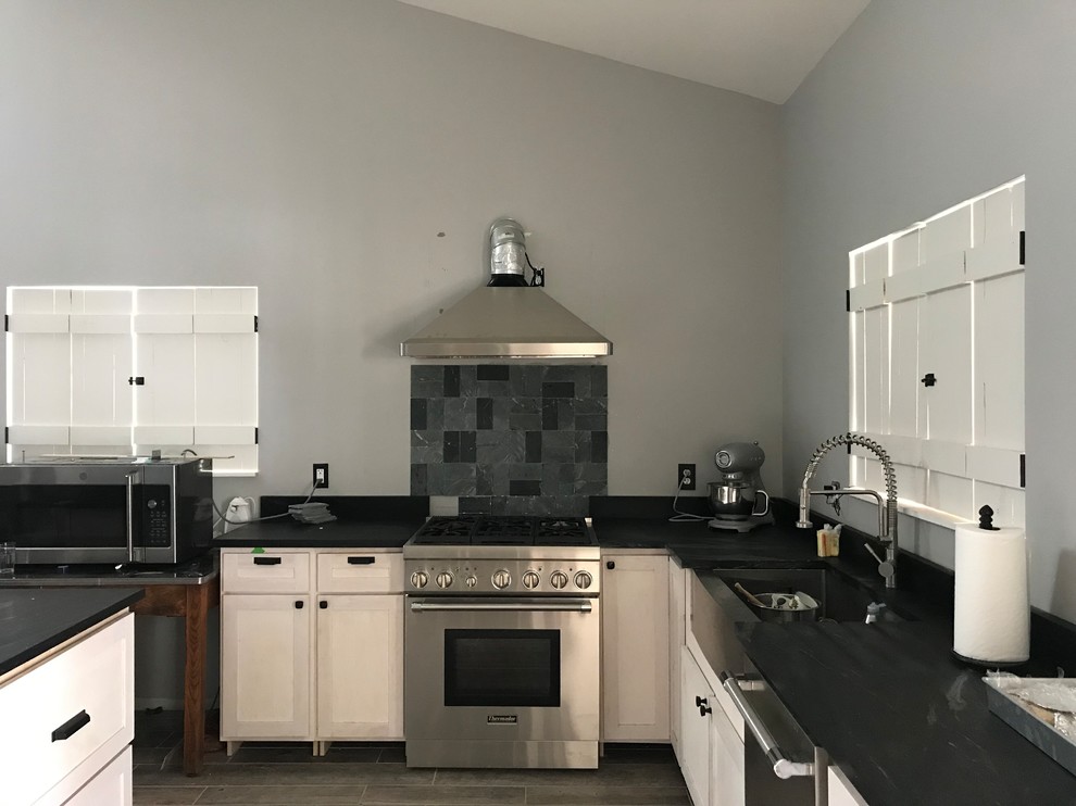 Range hood chimney mistake no upper cabinets and tile help needed