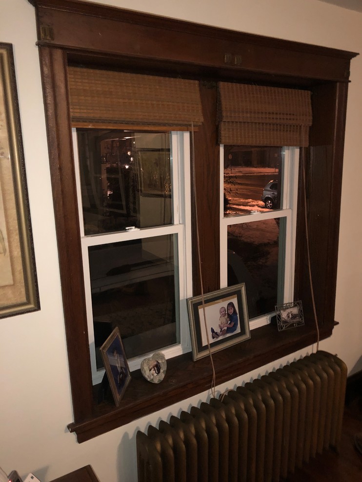 White vinyl windows look horrible with dark stained trim