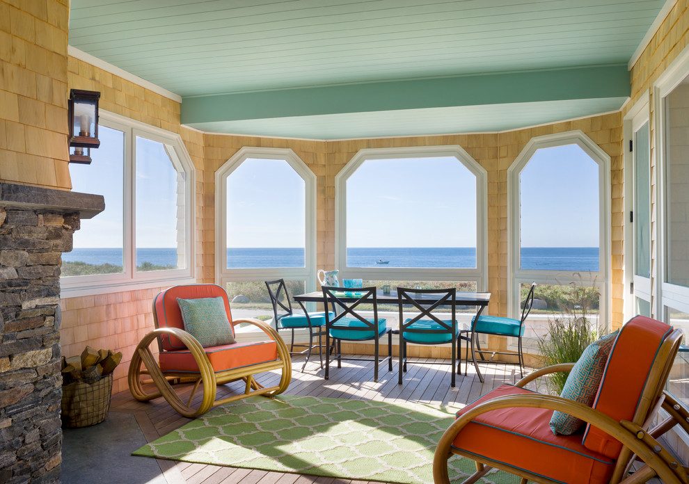 Beach style verandah in Providence with decking.