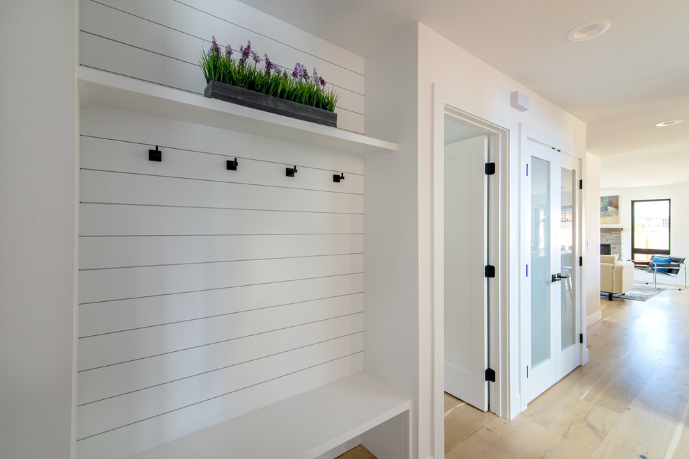 Photo of a large transitional hallway in Denver.