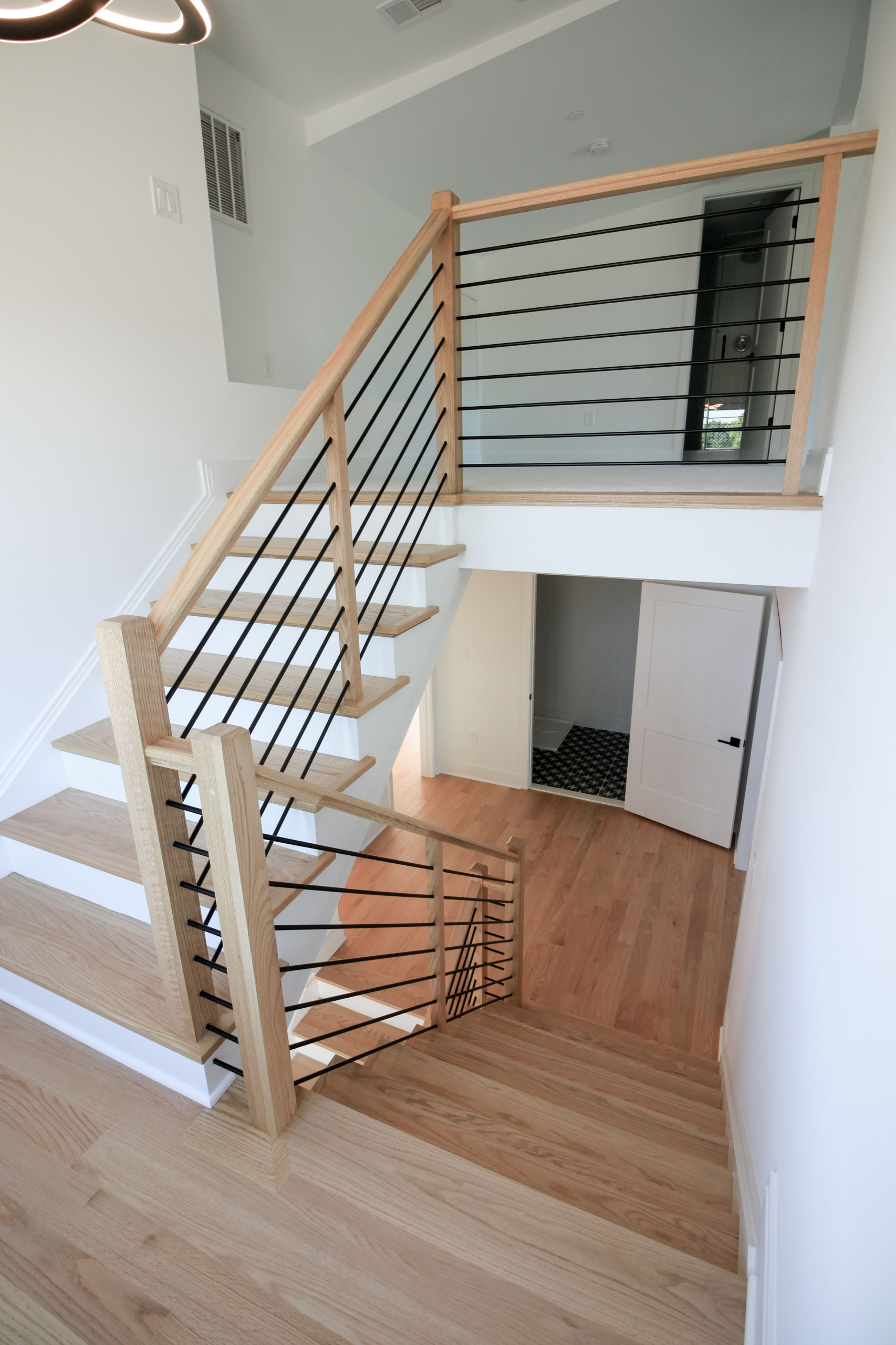 94_Neutral Color Floating Staircase with Metal Balusters, Bethesda MD 20817