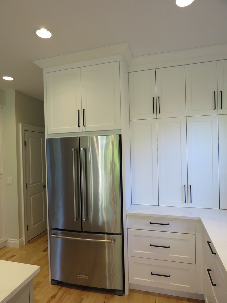 Example of a transitional kitchen design in Vancouver