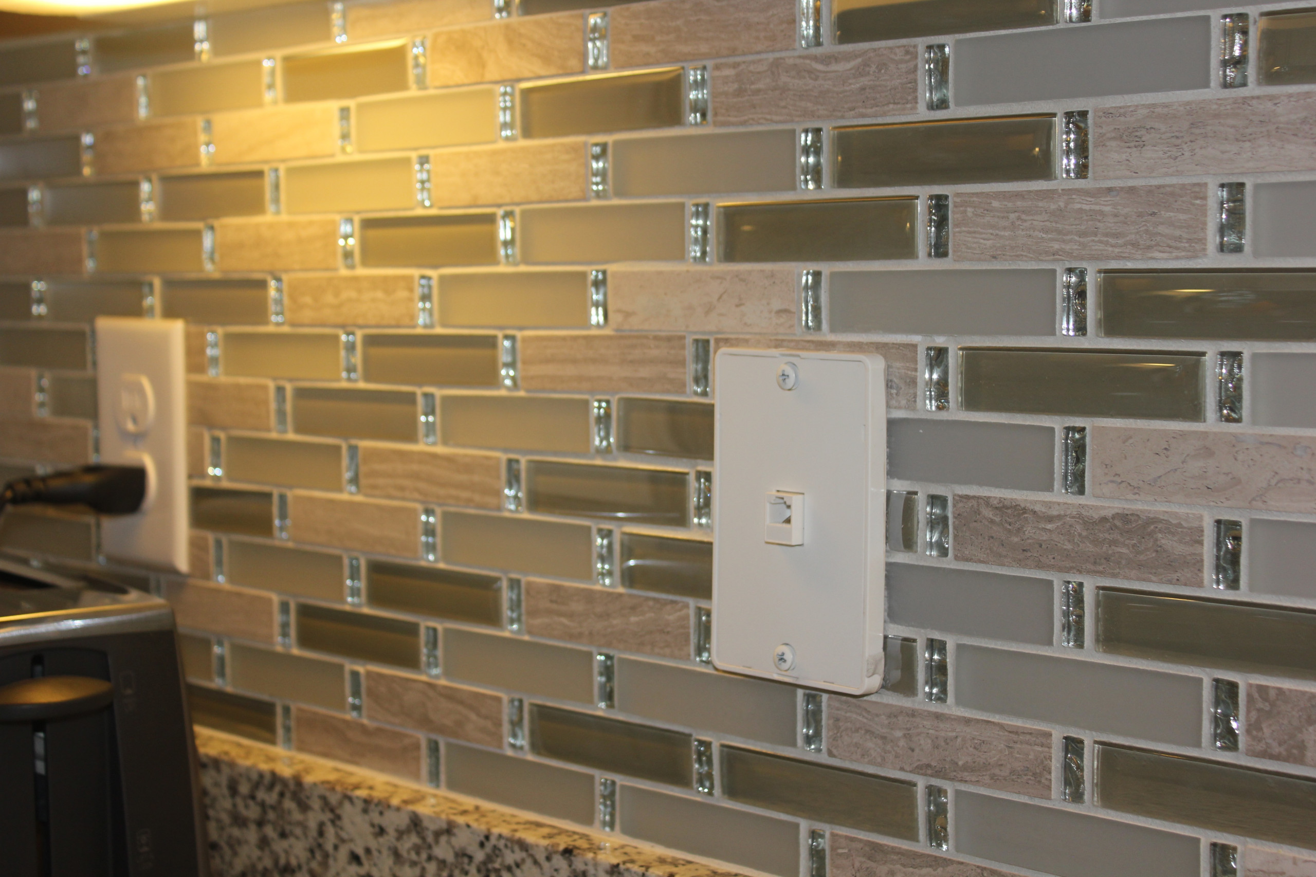Tile backsplash with bling was added above the kitchen counters