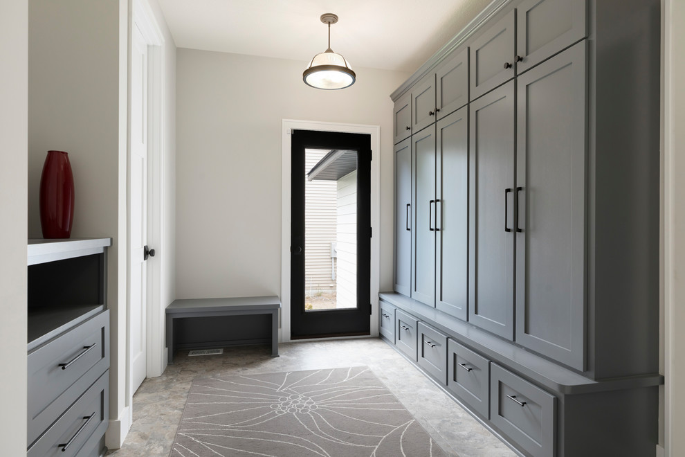 Inspiration for a large transitional mudroom in Minneapolis with grey walls, vinyl floors and multi-coloured floor.
