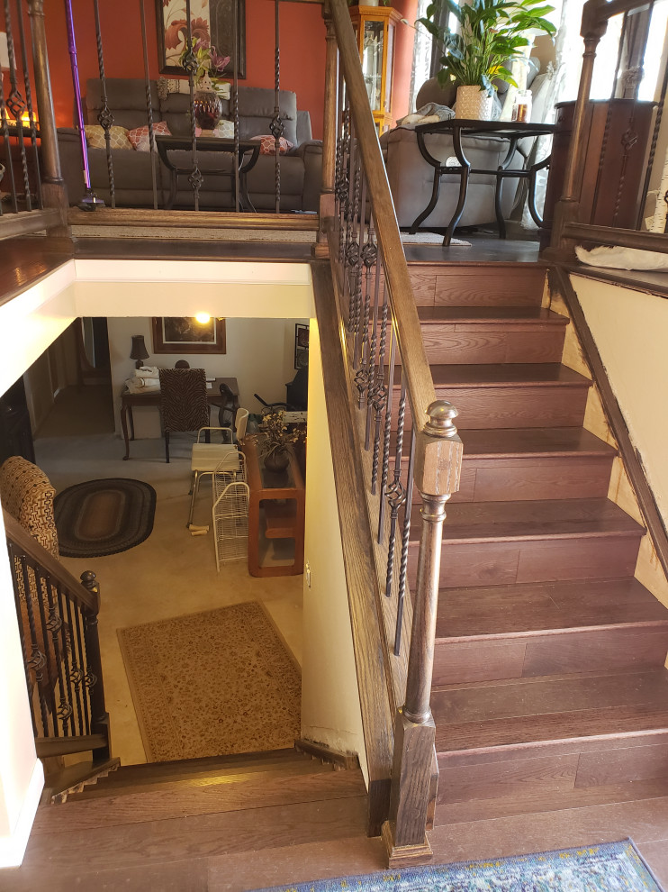 Classic Iron Balusters & Dark Wood Staircase Transformation