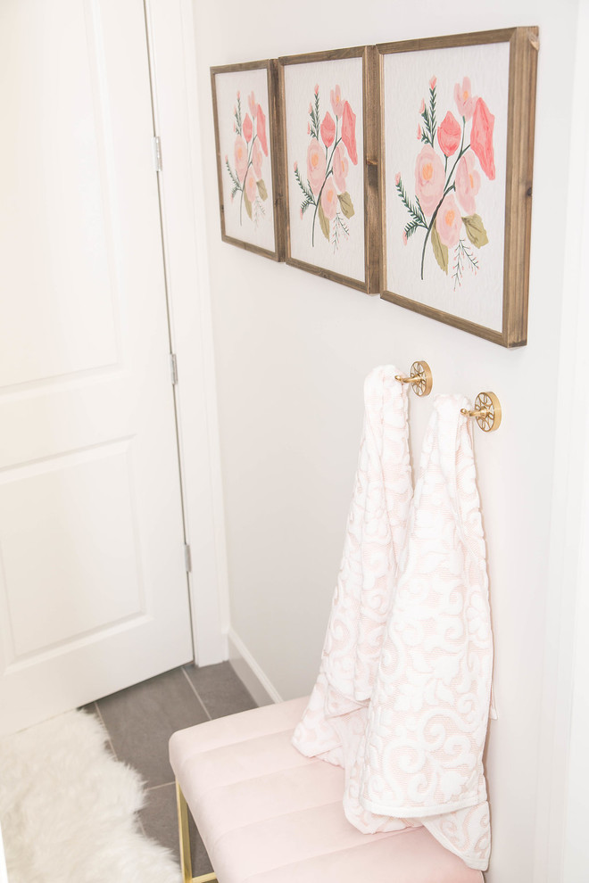 Bathroom - mid-sized transitional kids' white tile cement tile floor and gray floor bathroom idea in Phoenix with shaker cabinets, black cabinets, solid surface countertops and white countertops