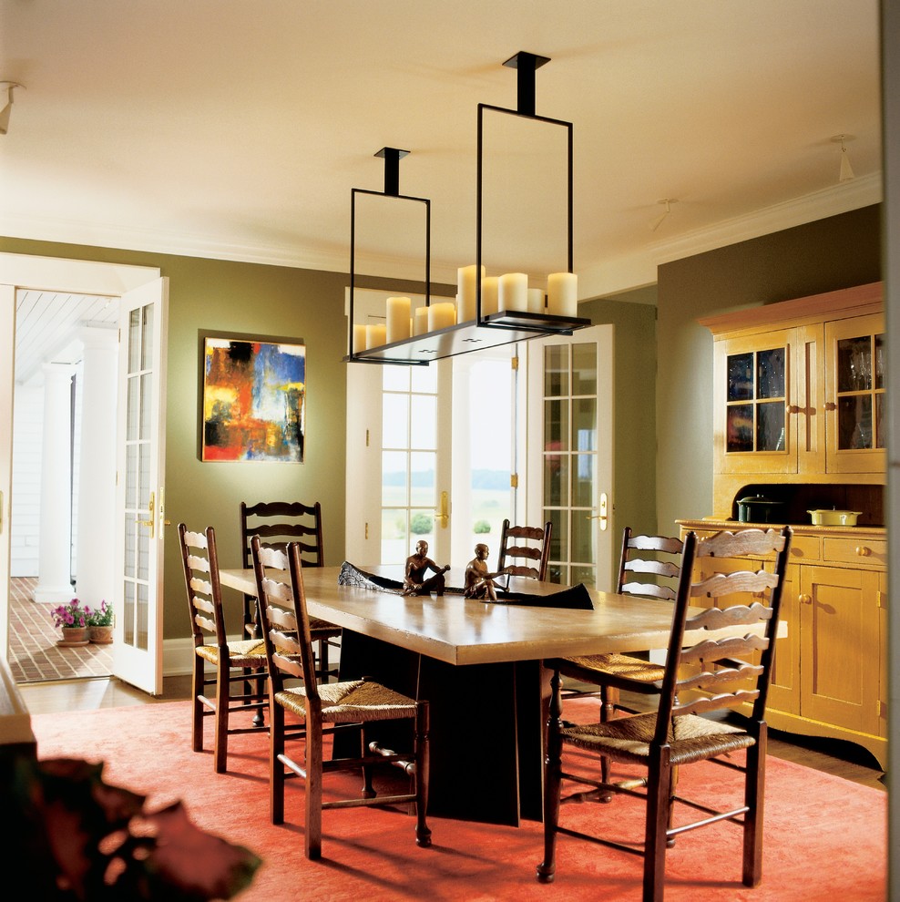 Design ideas for a country dining room in Richmond with green walls and dark hardwood floors.