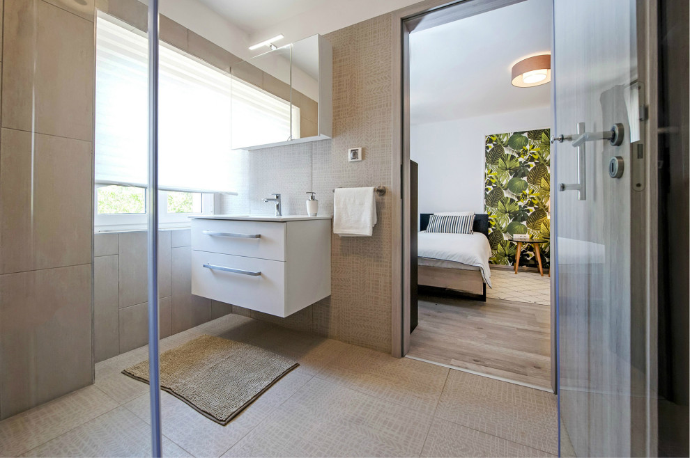Bathroom - mid-sized master beige tile white floor bathroom idea