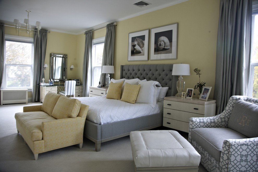 Photo of a beach style bedroom in New York with yellow walls.
