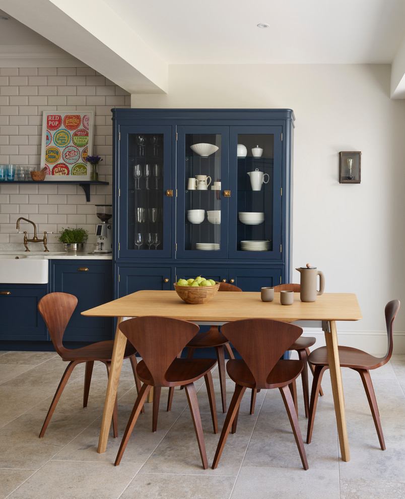 Design ideas for a large classic kitchen/dining room in Sussex with white walls and beige floors.