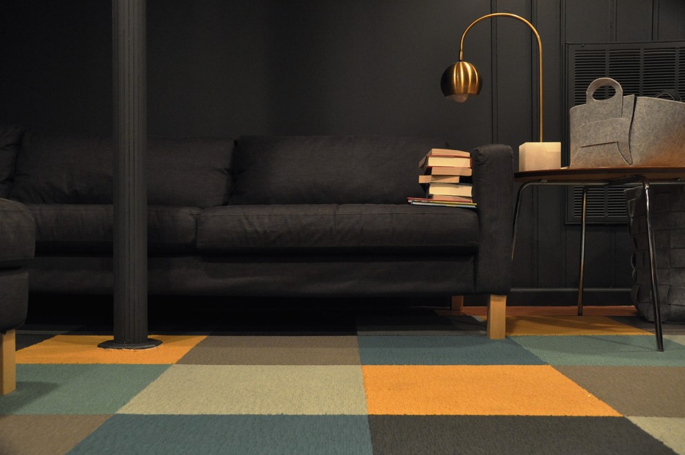 Inspiration for a scandinavian basement in New York with grey walls, carpet and multi-coloured floor.