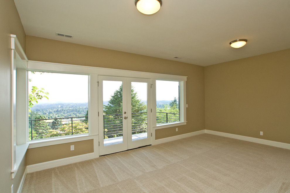 Inspiration for a large modern enclosed family room in Portland with brown walls, carpet and no fireplace.