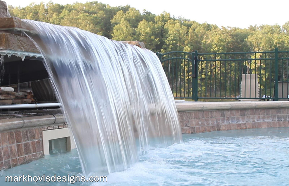 Pool fountain - rustic front yard wood, stone and custom-shaped natural pool fountain idea
