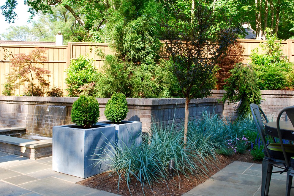 Photo of a contemporary patio in Charlotte.