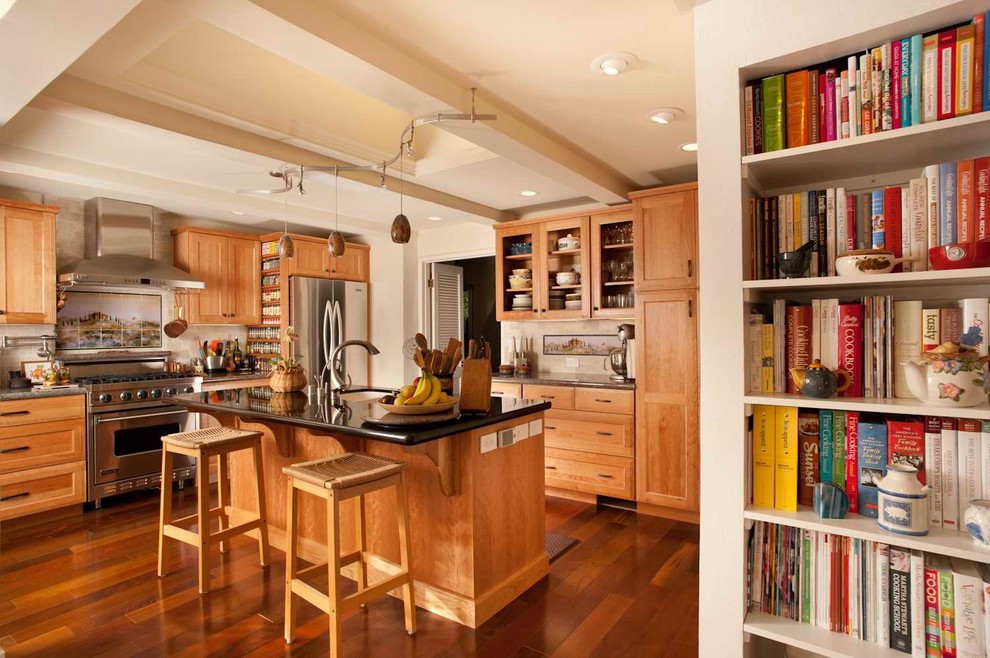 Mediterranean kitchen in San Francisco with shaker cabinets and stainless steel appliances.