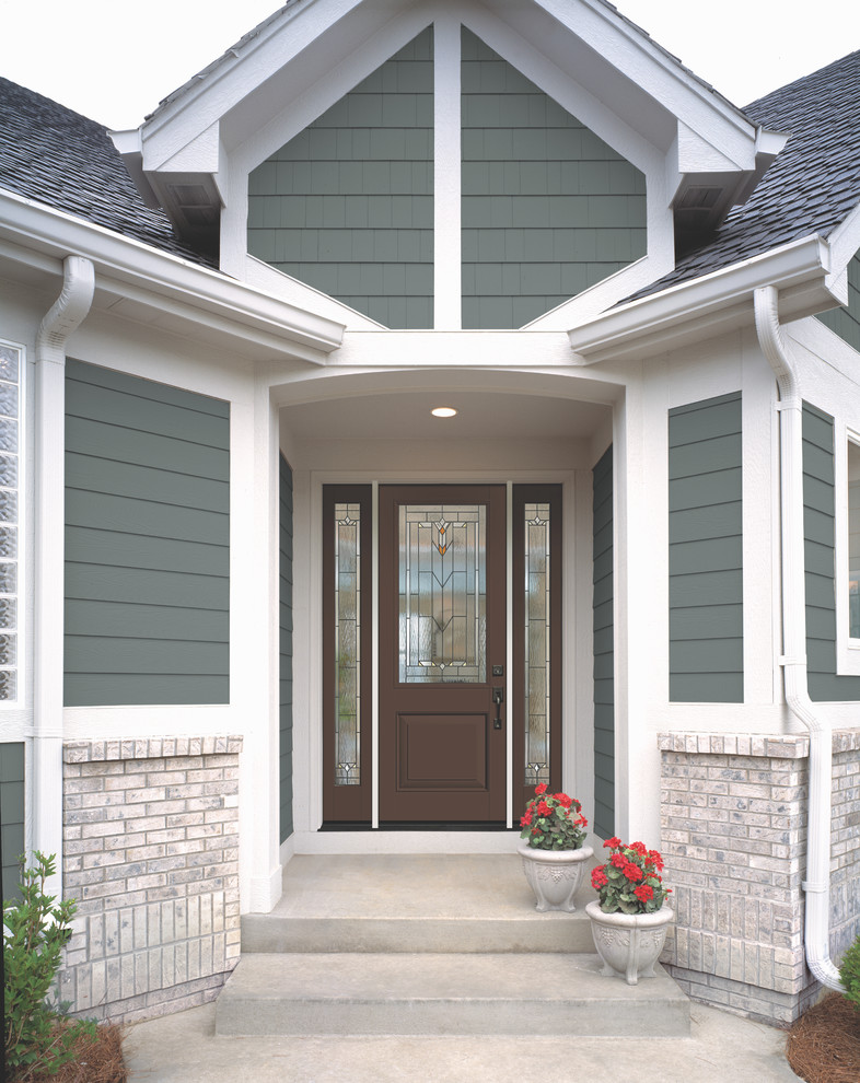 Inspiration for a mid-sized transitional front door remodel in Boston with a dark wood front door