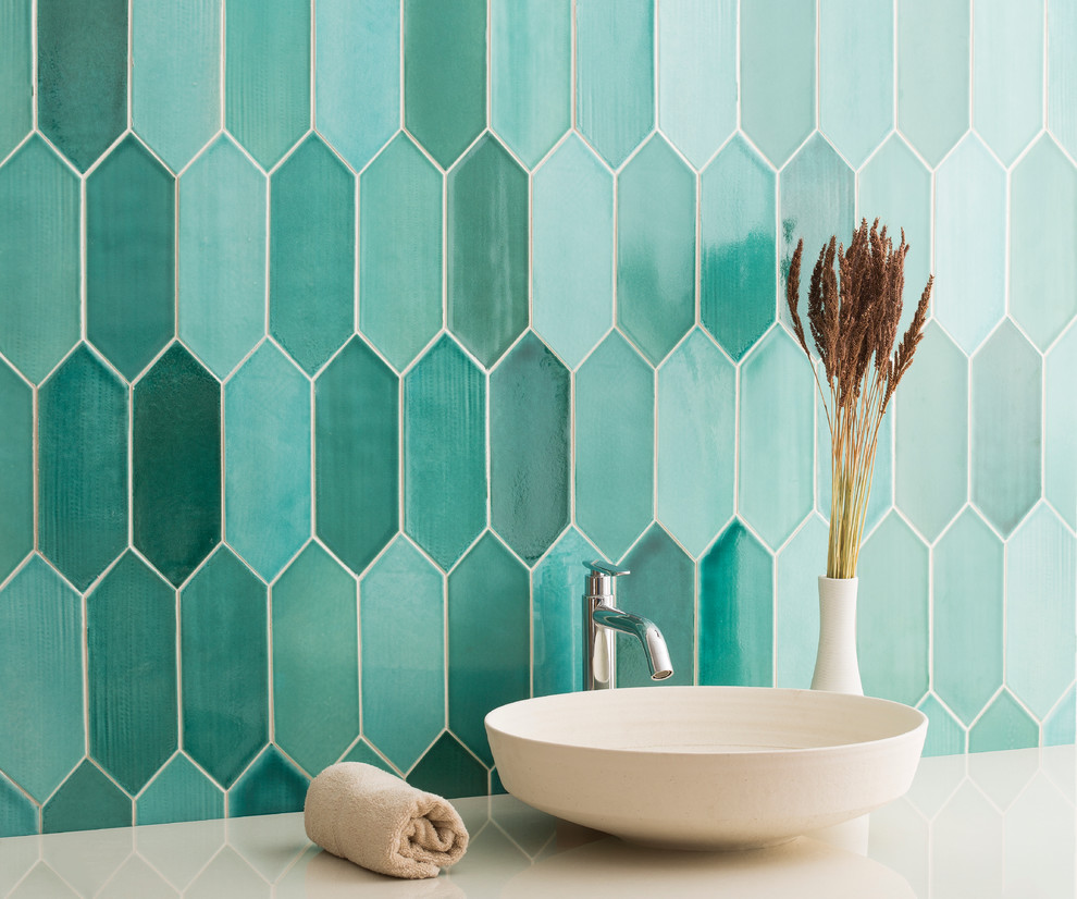 Design ideas for an arts and crafts powder room in Other with green tile, porcelain tile and green walls.