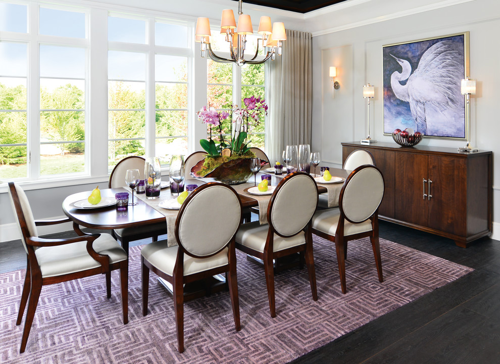Example of a mid-sized trendy dark wood floor and black floor kitchen/dining room combo design in Detroit with white walls and no fireplace