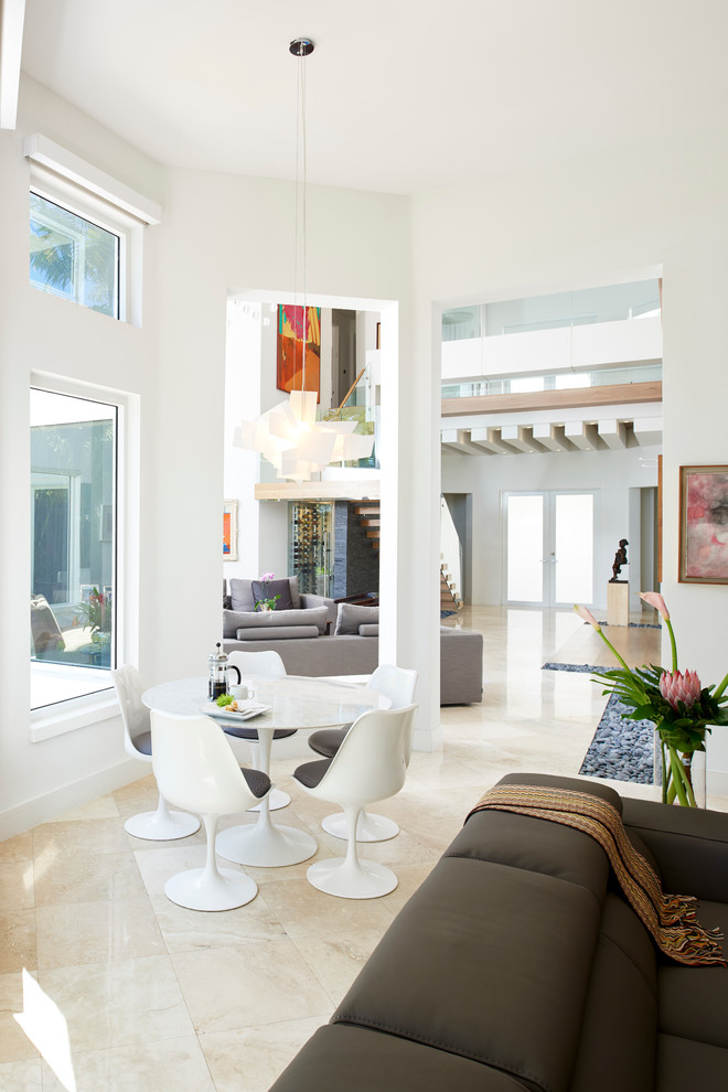 Inspiration for a small contemporary open concept family room in Miami.