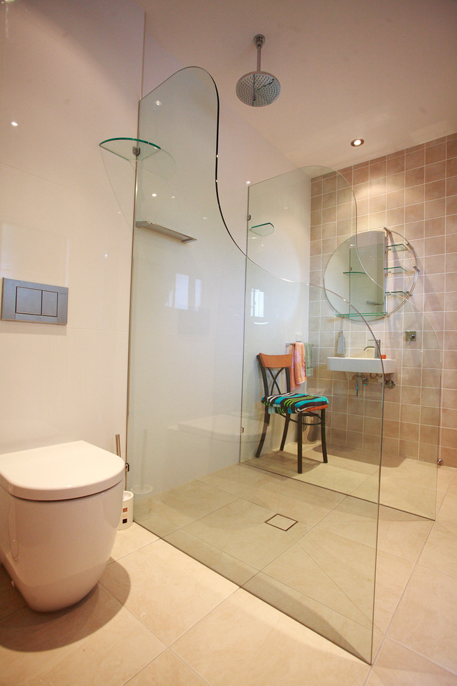 Design ideas for a large modern master bathroom in Brisbane with a wall-mount sink, an open shower, beige tile, travertine, beige walls, travertine floors and beige floor.